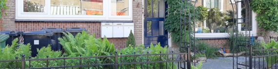 Sierhekwerk met rozenboog