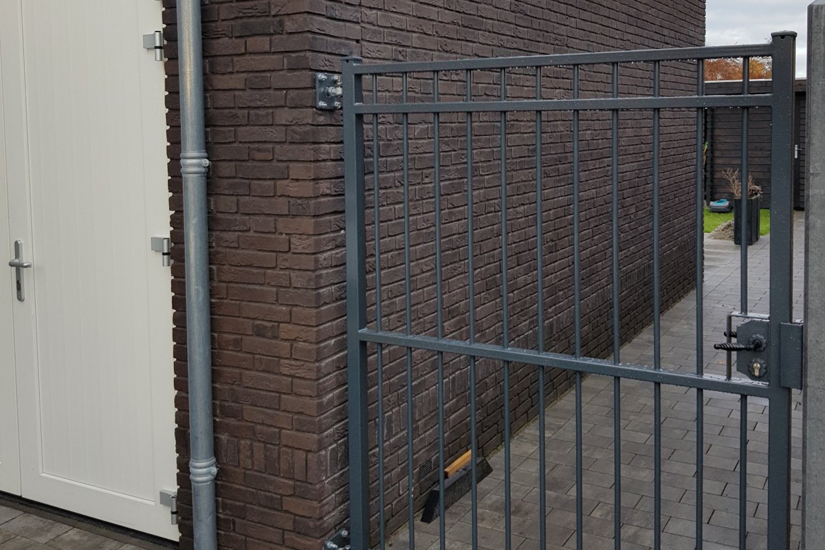 Tuinpoort laten lassen